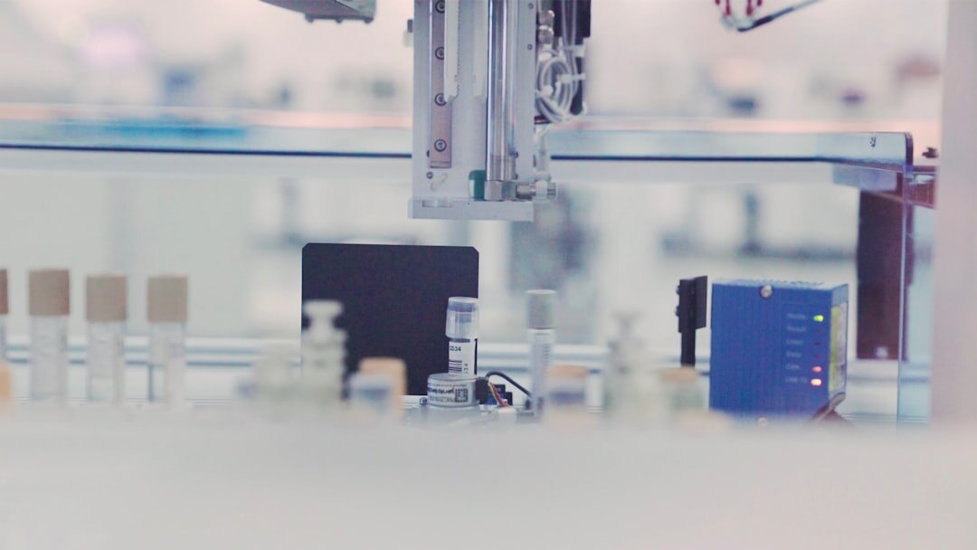 Futuristic humanoid robot standing in a bright laboratory
