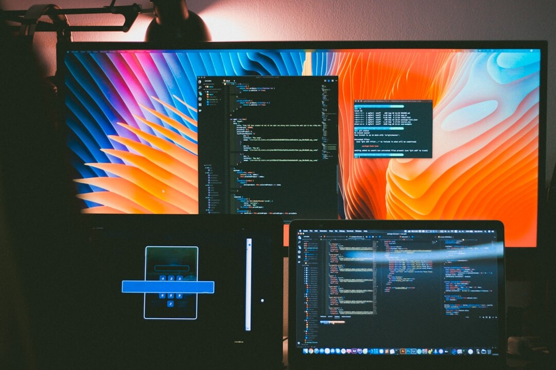 Futuristic technology workspace with multiple screens showing data visualization