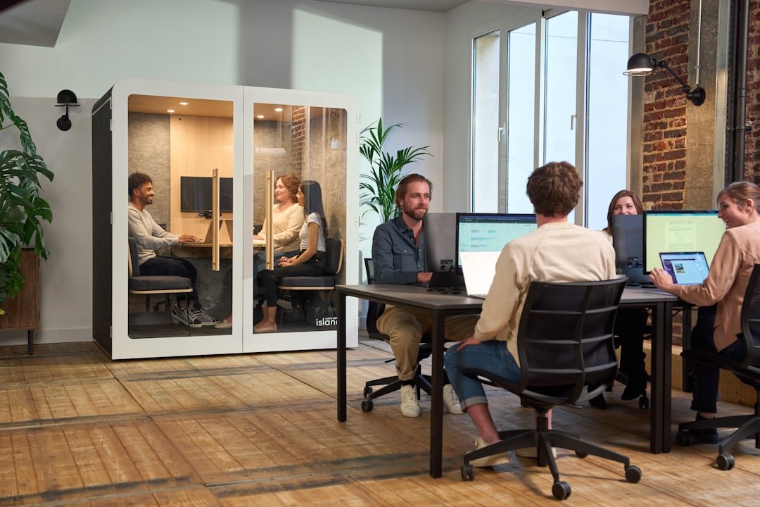 Modern startup office with open collaborative workspace and technology equipment